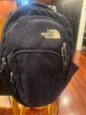 The North Face (Pivioter) Dark Blue Backpack with White Logo